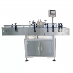 Oil bottle labeling machine