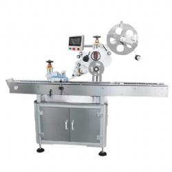 Ampoule labeling machine